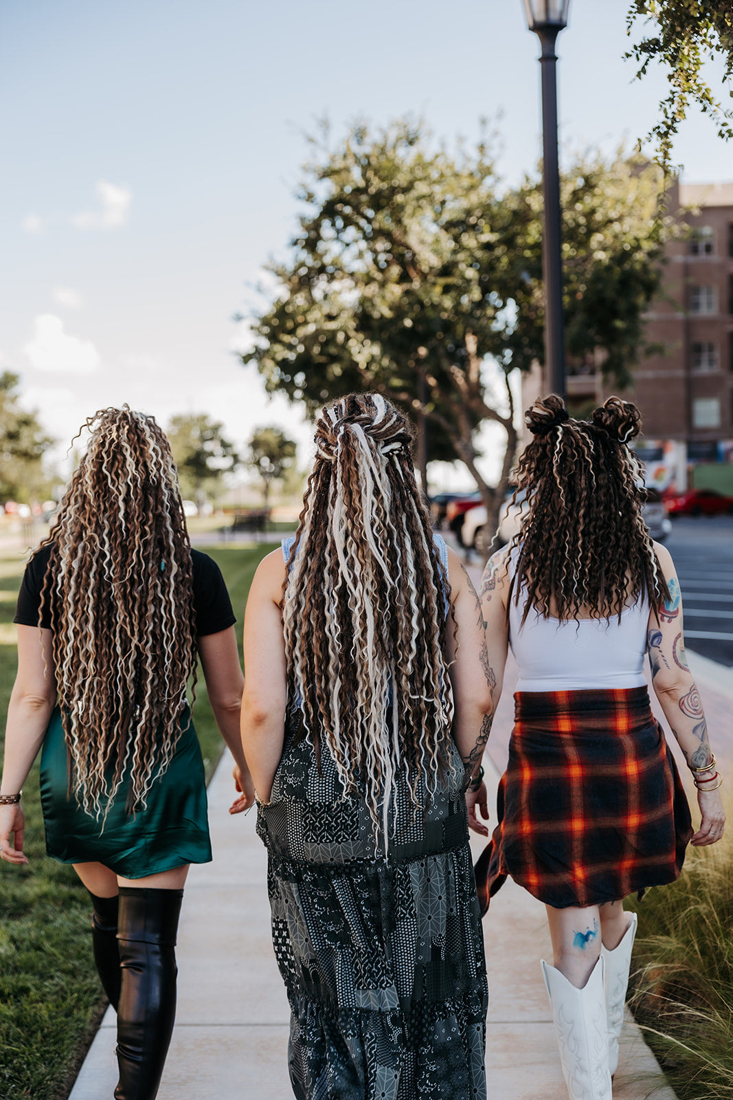 Wildcrafted Beauty SHORTIES™ braid-in dreadlock extensions in Shorties and long length showing comparison