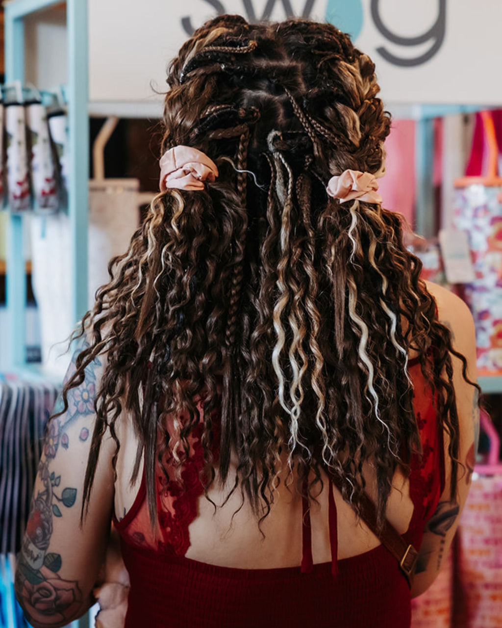 Person with styled hair in a salon setting