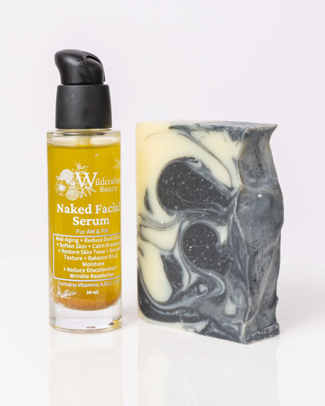 A photo of a facial cleansing bar and a pump bottle of facial serum with label, on a white background.