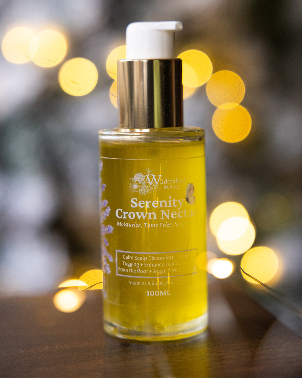 Bottle of Serenity Crown Nectar in front of a blurred background with lights.