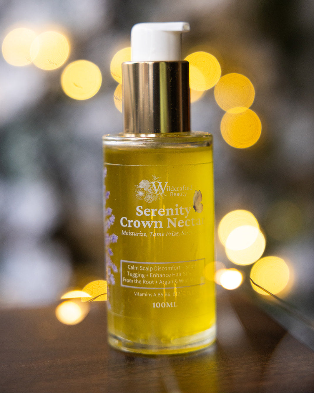 Bottle of Serenity Crown Nectar in front of a blurred background with lights.