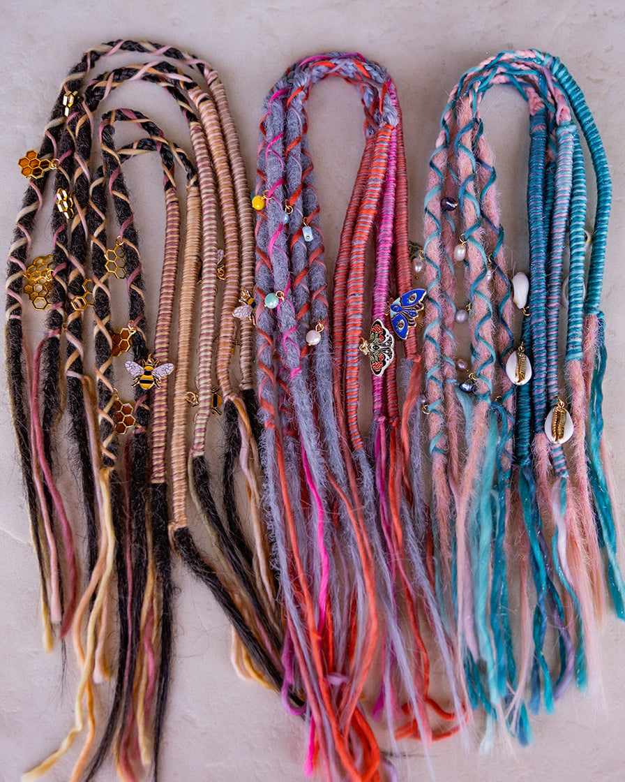 short straight accent wraps with charms