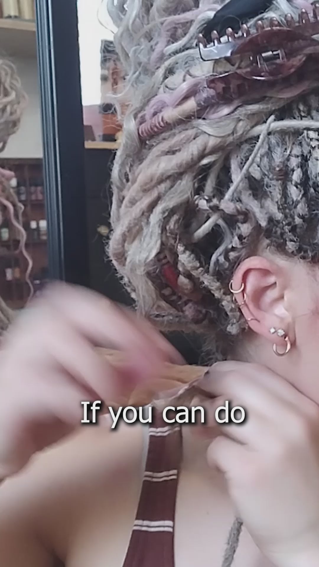 Video tutorial showing how to install semi-permanent braid-in hair extensions, also called double ended dreadlock extensions, using a simple three-strand braid technique for added volume and length. Demonstrated on various hair colors and styles.
