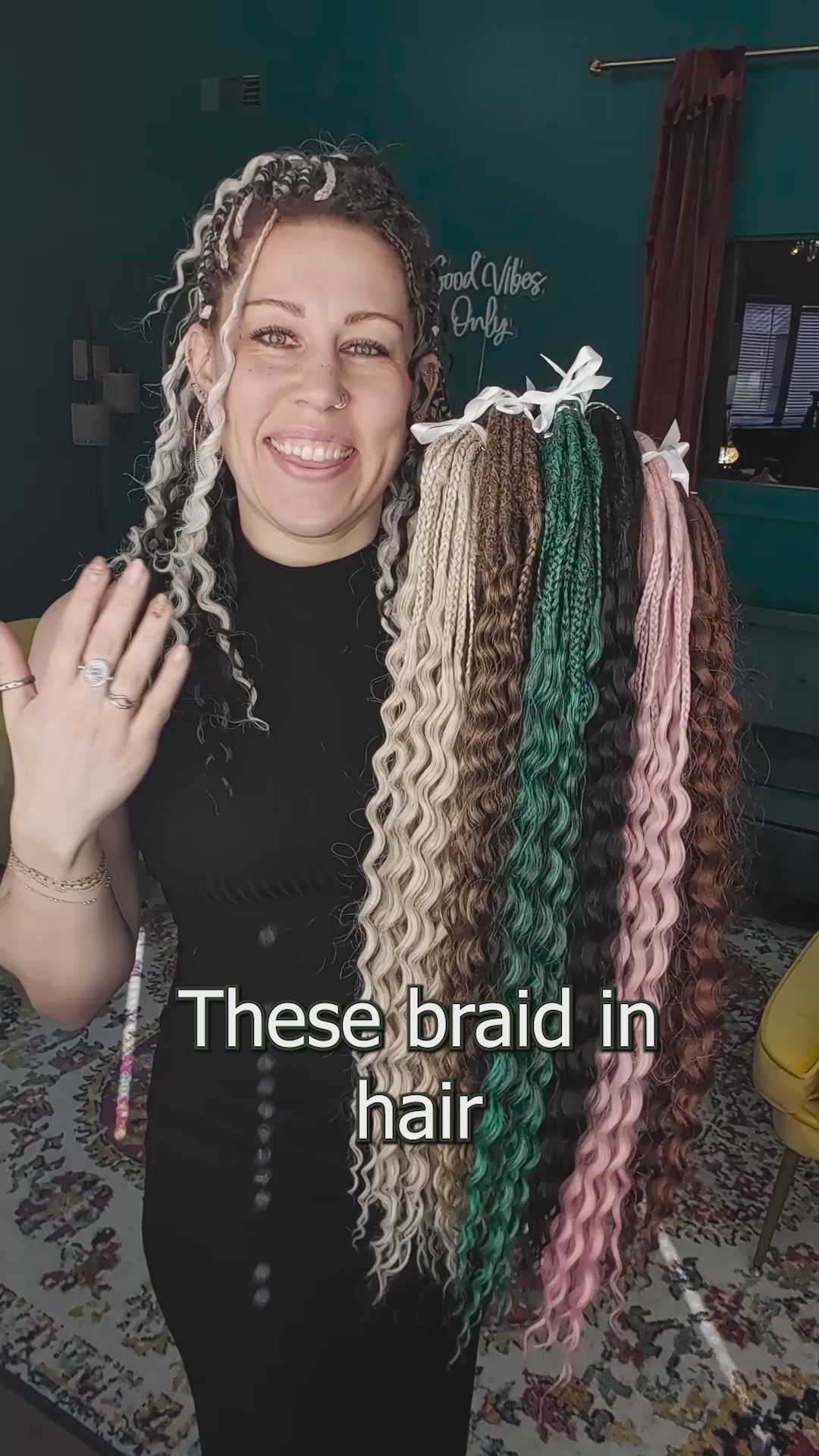 Product overview of wavy braid-in hair extensions, also know as dreadlock extensions, showing a wide range of colors from natural blonde to vibrant pink and green. Demonstrates the easy three-strand braid install, shampoo care, and the complete installation kit included with every order.